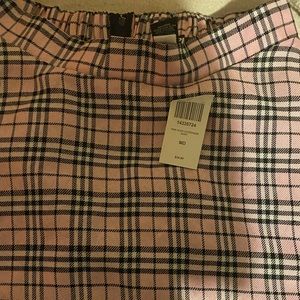 This is a pink skirt I’ve never use it is in good condition.